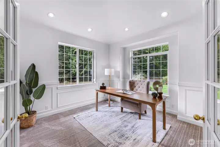 Bonus room on the main floor is perfect for office, media room, study or music room