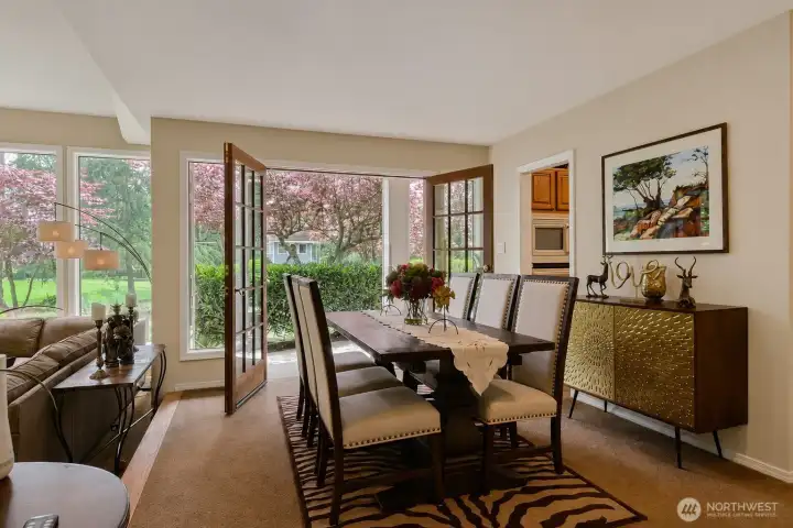 Dining room with the French doors open to the fabulous yard views Incredible Dining room with the French doors open to the fabulous yard views Incredible