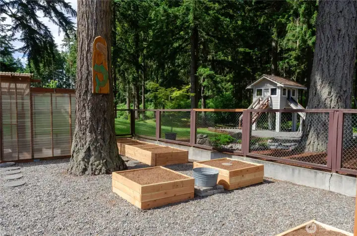 More raised beds and the tree house to the right More raised beds and the tree house to the right