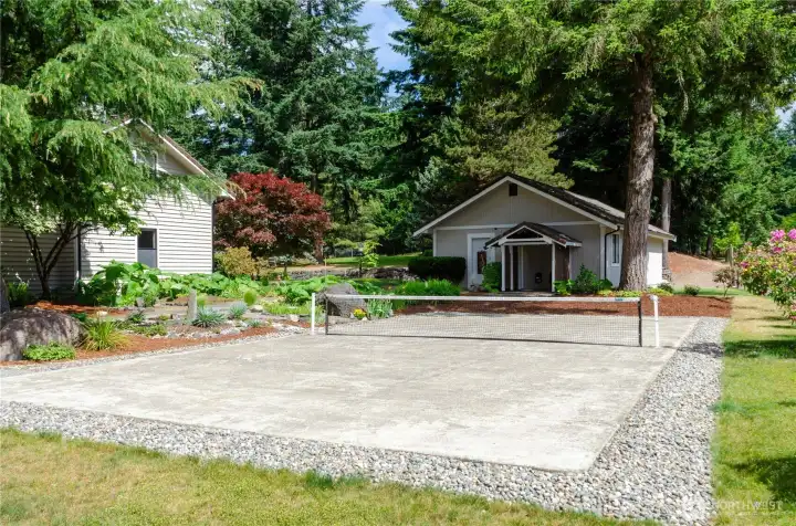 Pickle Ball court looking towards the shop entrance at the side of the detached garage. Imagine the fun to be had here! Pickle Ball court looking towards the shop entrance at the side of the detached garage. Imagine the fun to be had here!