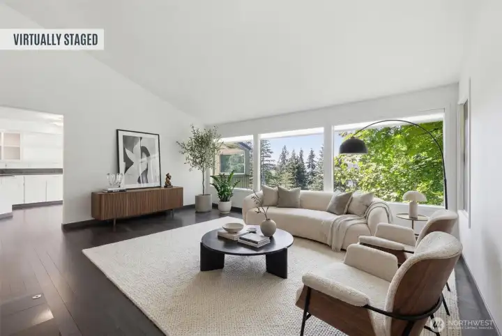 Virtually staged living room showcasing the spacious layout, expansive windows, abundant natural light, and peaceful treetop views. Virtually staged living room showcasing the spacious layout, expansive windows, abundant natural light, and peaceful treetop views.