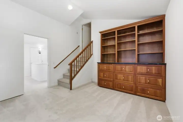 Flexible upper-level retreat with custom built-in shelving, abundant storage, and endless possibilities for a home office, library, craft room, or study. Flexible upper-level retreat with custom built-in shelving, abundant storage, and endless possibilities for a home office, library, craft room, or study.