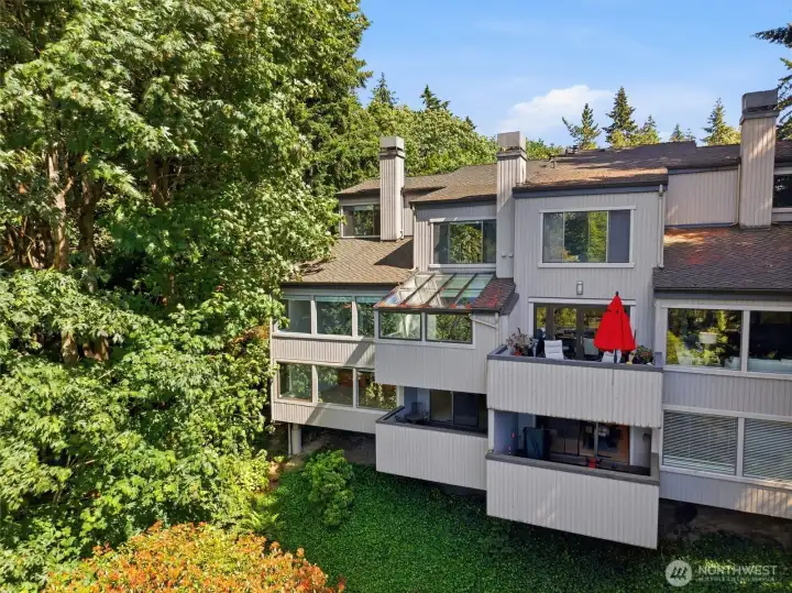 Enjoy exceptional privacy and seamless indoor-outdoor living with multiple decks, covered outdoor spaces, and tranquil woodland surroundings. Enjoy exceptional privacy and seamless indoor-outdoor living with multiple decks, covered outdoor spaces, and tranquil woodland surroundings.