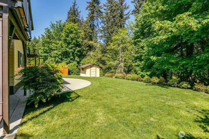Home backs up to a wooded greenbelt offering privacy and view of trees Home backs up to a wooded greenbelt offering privacy and view of trees