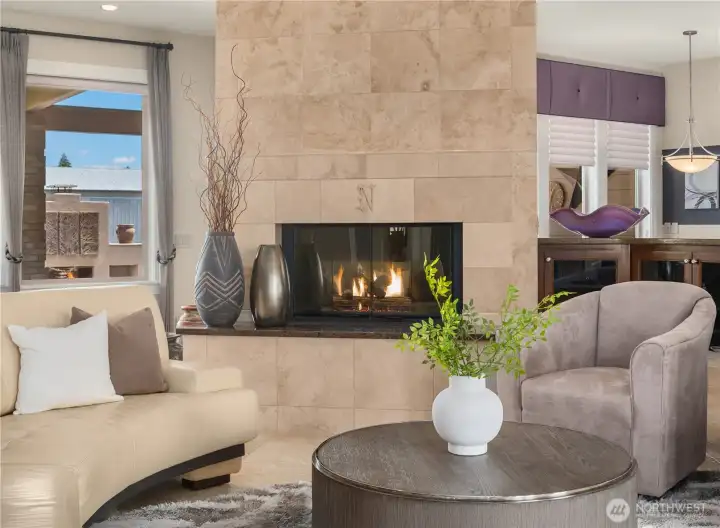 Cozy up with a good book by the beautiful fireplace~