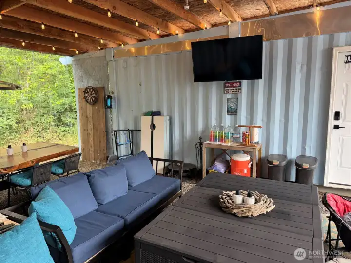 Watch TV and keep dry! Shipping container #2 is being used as a shop