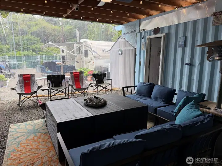 Heavy duty plastic curtains cover the entrance to outdoor covered area, keeping the elements away!