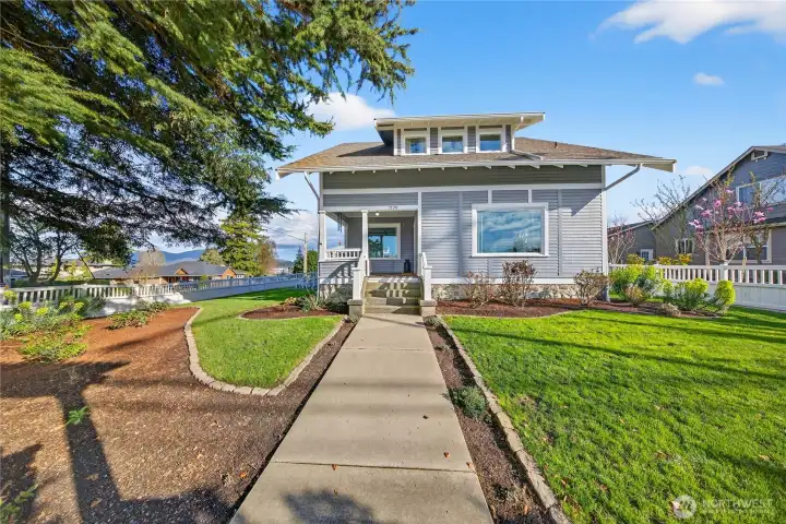 Freshly landscaped this fenced yard is perfect for pets and spending time outside in the sunshine.