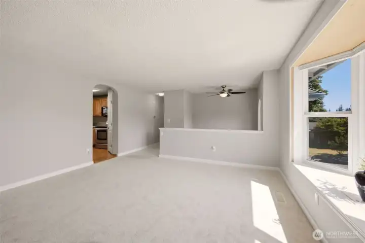 Wall to the left is non- bearing, leads to the kitchen