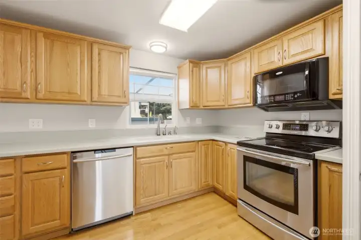 Refreshed kitchen with solid wood cabinetry