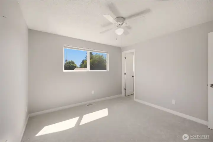 Primary bedroom offers an ensuite bathroom