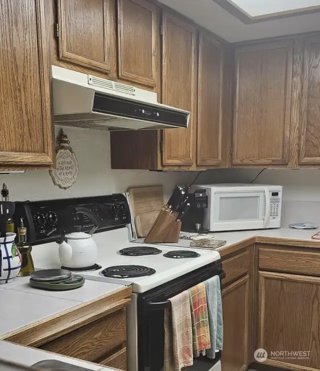 The kitchen has tons of cabinetry.