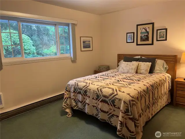 Guest bedroom overlooks the backyard.