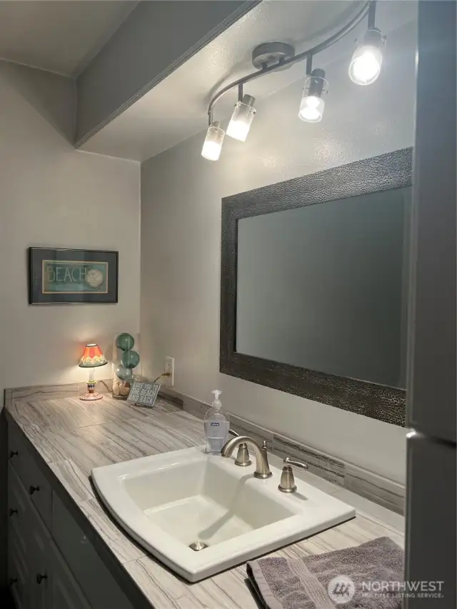 Completely remodeled full bathroom just outside of the quest bedroom.