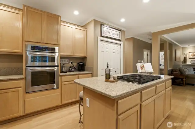 Kitchen with wall oven + built in microwave and 2 pantries