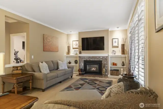 Cozy Family room off kitchen with gas fireplace