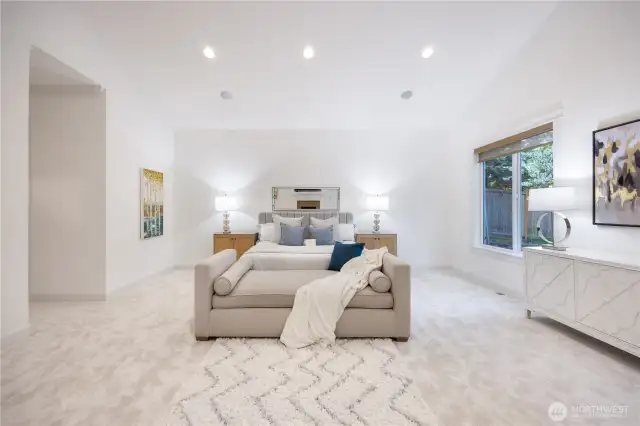 Grand master suite with vaulted ceiling and fireplace