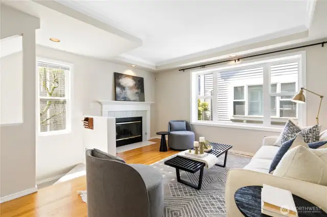 Big bay of windows plus cozy gas fireplace