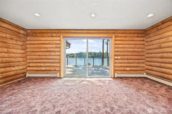 Your personal escape: large primary bedroom with direct access to the deck and endless views.
