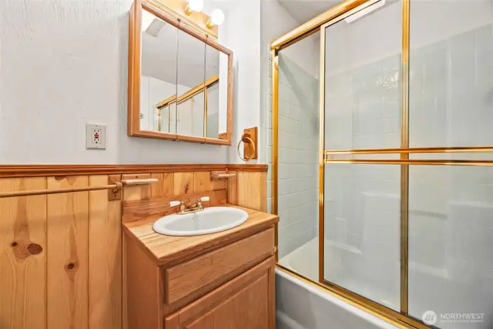 Thoughtful design meets function: full bathroom downstairs for all your needs.