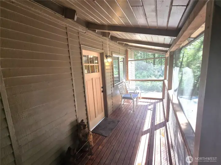 This great front porch is fully covered and fully screened. This allows you to use this area, rain or shine and keep nature out while letting in the sunshine and the views.