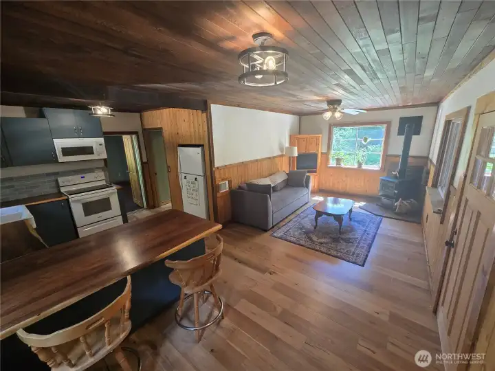 Beautiful hardwood floors and custom woodwork throughout the home.