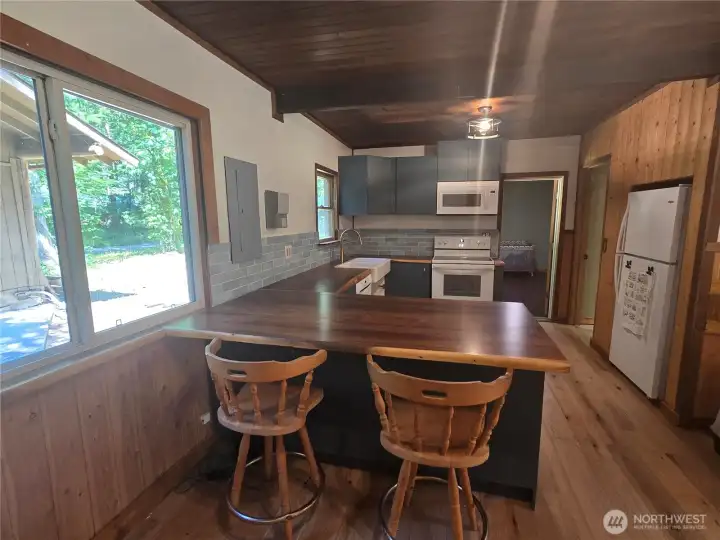 View of kitchen from dining room space.