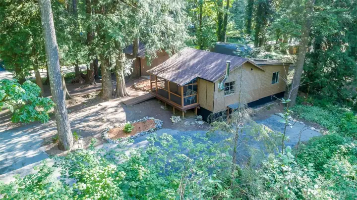The home sits in a cozy setting in this riverfront community.