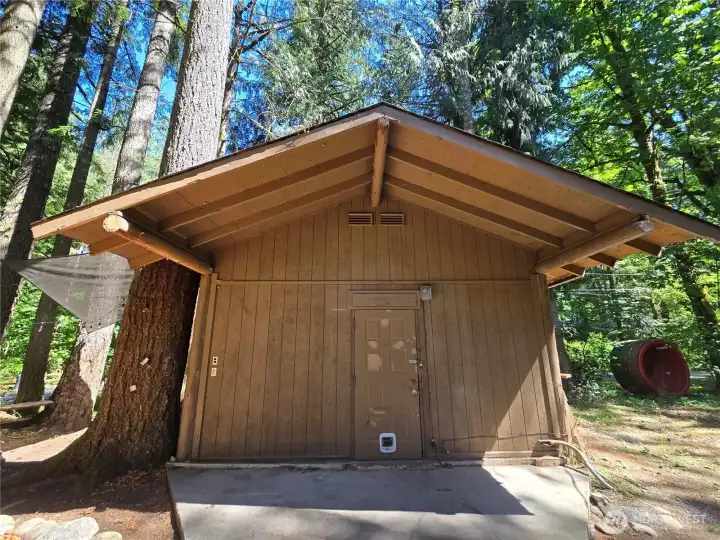 Nice covered entry to your large shop. Could be converted to additional living space.