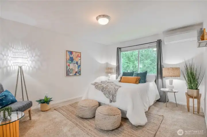 The spacious primary bedroom features a 3/4 bath and walk-in closet offering comfort, convenience, and ample storage.