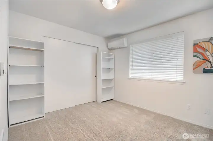3rd bedroom  with built-ins and generous size closet. and a mini split.