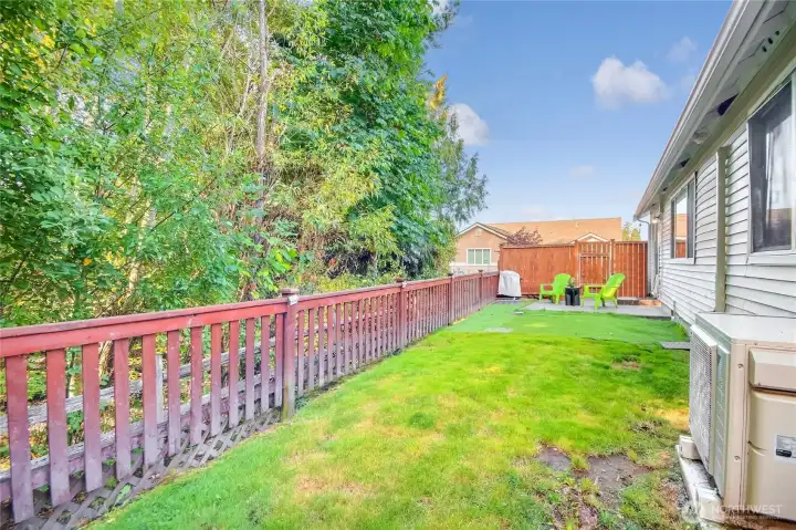 Private fenced yard perfect for entertaining, pets or just enjoying your own space.  HOA takes care of all yard maintenance.