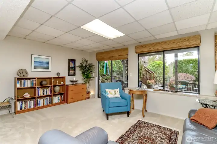 Direct Access to Backyard from daylight basement patio doors.