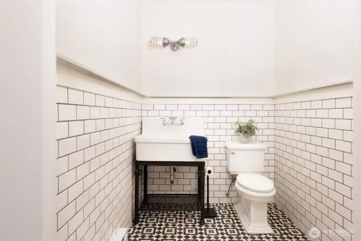 Charming private half bath.