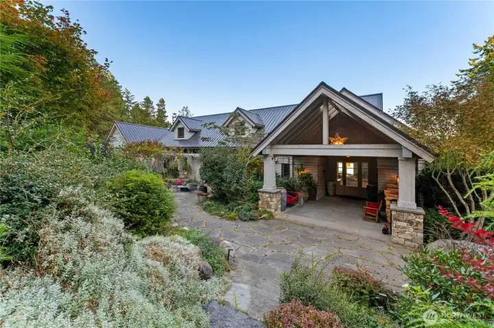 The covered entry is one of the owner's favorite spots to sip coffee bundled up on a rainy or snowy morning.