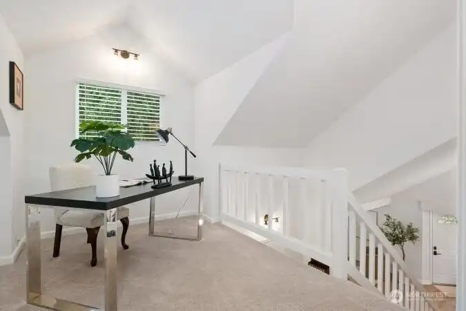 Loft area on the second floor has many uses. Could make a good study area, adjacent to primary bedroom suite.