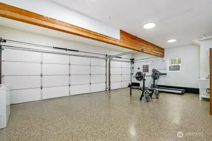 Interior of 3 car garage. Nice epoxy finished floor