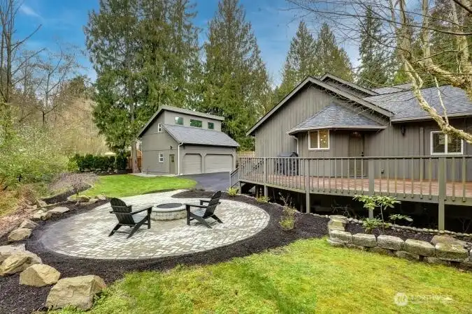 New fire pit & patio next to deck