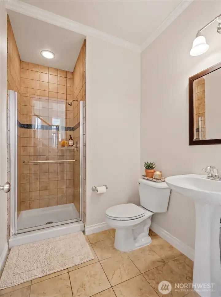 Main level bathroom. Virtually staged.