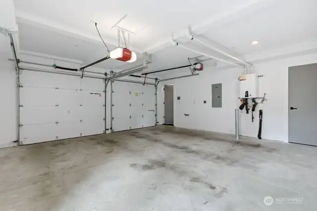 Spacious garage with a storage room