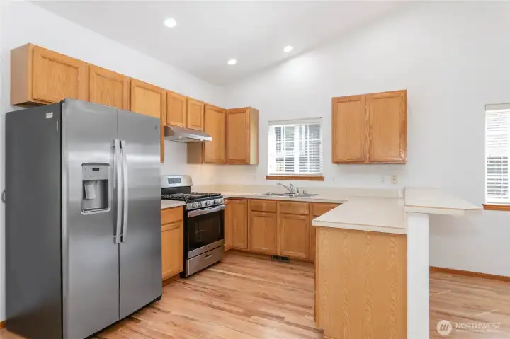 Kitchen features stainless steel appliances