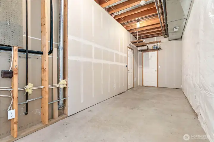 Extra large storage room off garage and bonus room provides plenty of additional space for seasonal & holiday totes