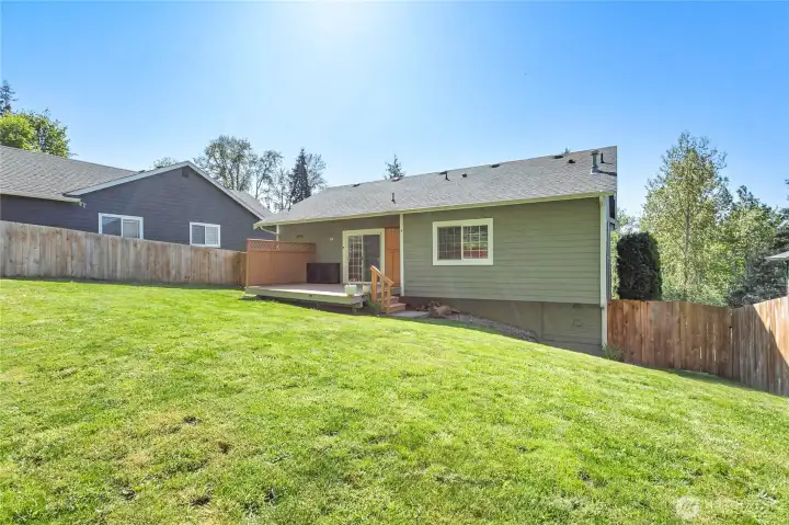 Large backyard and deck - provide lots of space for enjoying spring & summer weather
