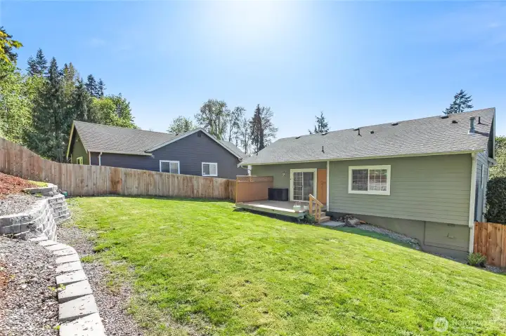Large backyard and deck - provide lots of space for enjoying spring & summer weather