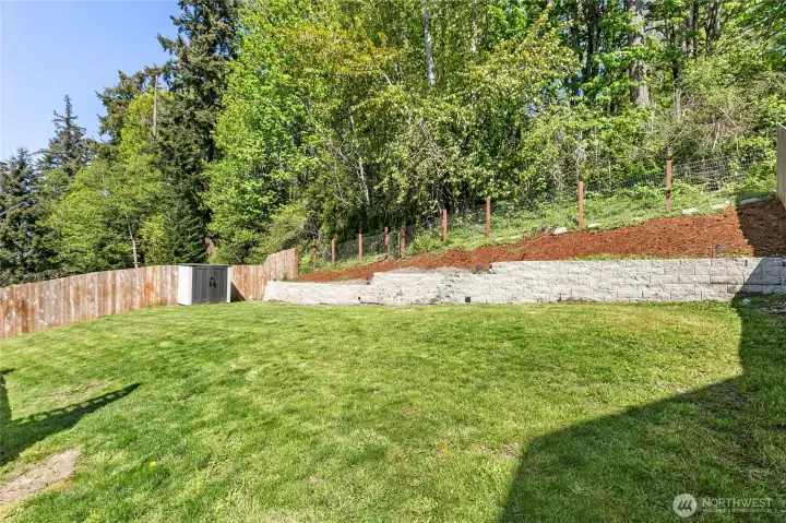Backyard provides is tranquil and provides lots of privacy, backing to a wooded area