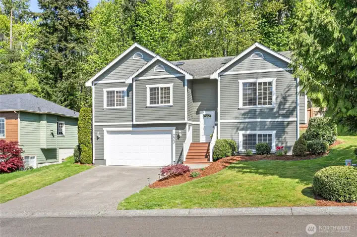 Welcome Home - 2-car garage and driveway provides plenty of room for parking