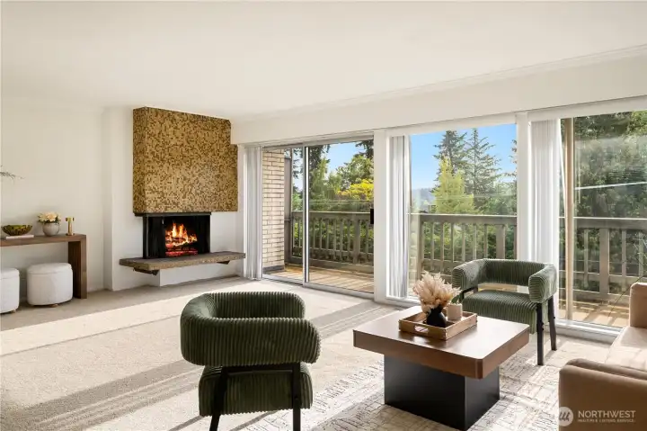 A wall of windows flood the space with morning sunlight. A wall of windows flood the space with morning sunlight.