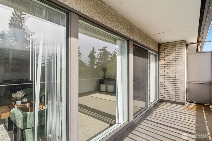 Oversized terrace with space for a bistro table and container gardening. Oversized terrace with space for a bistro table and container gardening.
