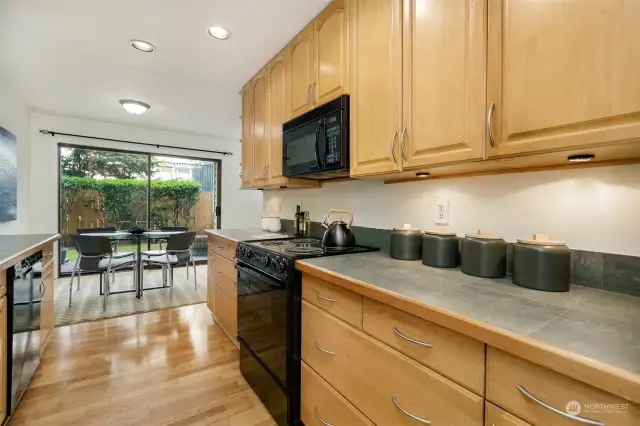 The kitchen features plenty of counter and cupboard space.
