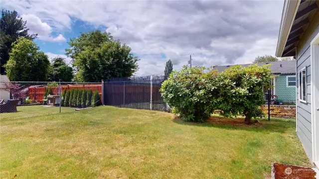 The backyard is fully fenced